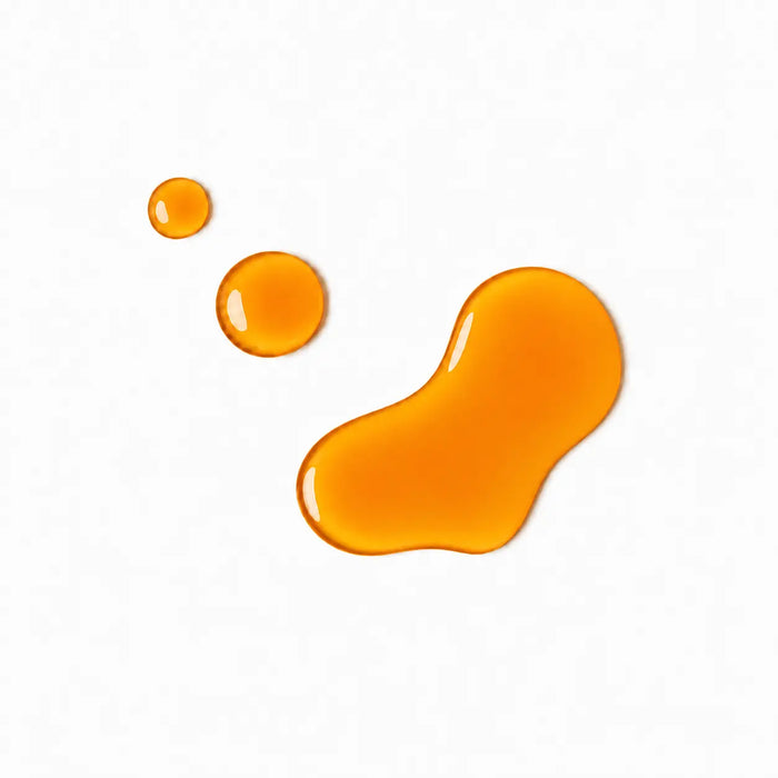 Orange droplets on a white background